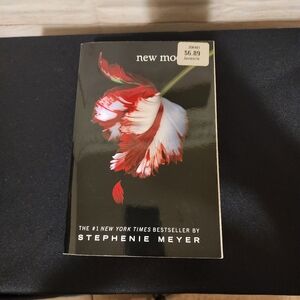 Free With Any Purchase. Add To Bundle. New Moon by Stephenie Meyer Book